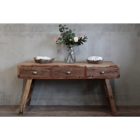 Rustic wooden console table with three drawers and metal handles made from recycled wood in natural finish