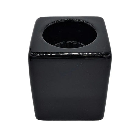 Contemporary black square ceramic tealight holder with glossy finish and circular opening for tealight use