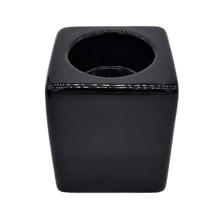 Contemporary black square ceramic tealight holder with glossy finish and circular opening for tealight use