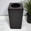 Contemporary brown square ceramic tealight holder tall with a black glossy square trash can featuring a circular top opening