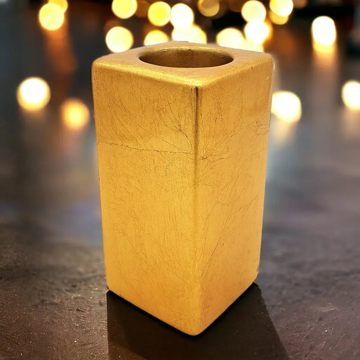 Golden rectangular ceramic tealight holder with textured surface and central opening 5cm square size