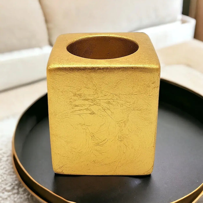 Contemporary gold square ceramic tealight holder in 5cm square with textured matte finish and subtle leaf etchings