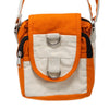 Orange and cream cotton canvas body bag with black zipper accents and silver metal hardware in turmeric color