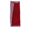A cotton pario towel in hot pink with red and maroon stripes, solid panel, fringed edges, and a gathered top