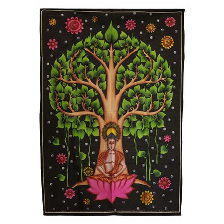 A vibrant cotton wall art tapestry showing buddha meditating under a green bodhi tree with pink and yellow flowers on black