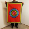 Cotton wall art with vibrant red tapestry featuring a colorful geometric mandala framed by a yellow patterned border