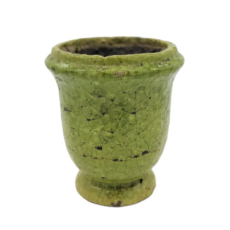 A vintage-style green ceramic plant pot with crackle glazed terracotta finish and subtle black speckles