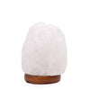 White crystal rock himalayan salt lamp with rough texture and warm amber wooden base highlighting hygroscopic properties