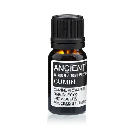 A small amber glass bottle with black cap containing ancient wisdom 10ml pure cumin seed essential oil from steam distillation