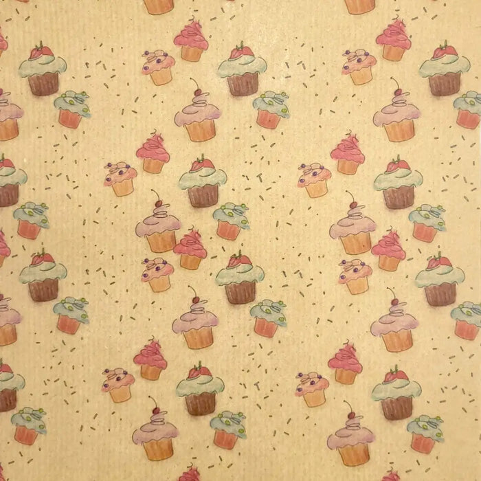 Cupcake-themed recycled kraft wrapping paper with beige background and pink green frosting cupcakes topped with cherries and strawberries