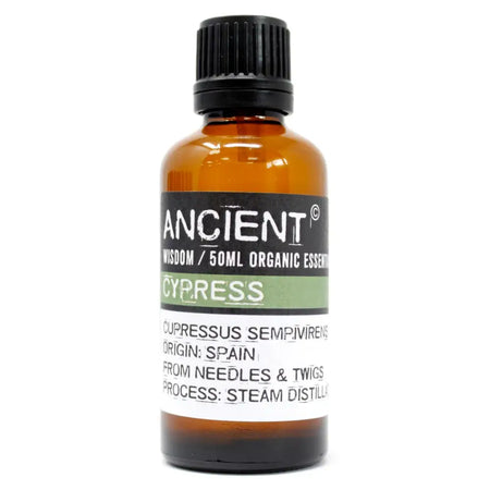 A 50ml amber glass bottle of cypress essential oil with black ribbed cap from spain made by steam distillation