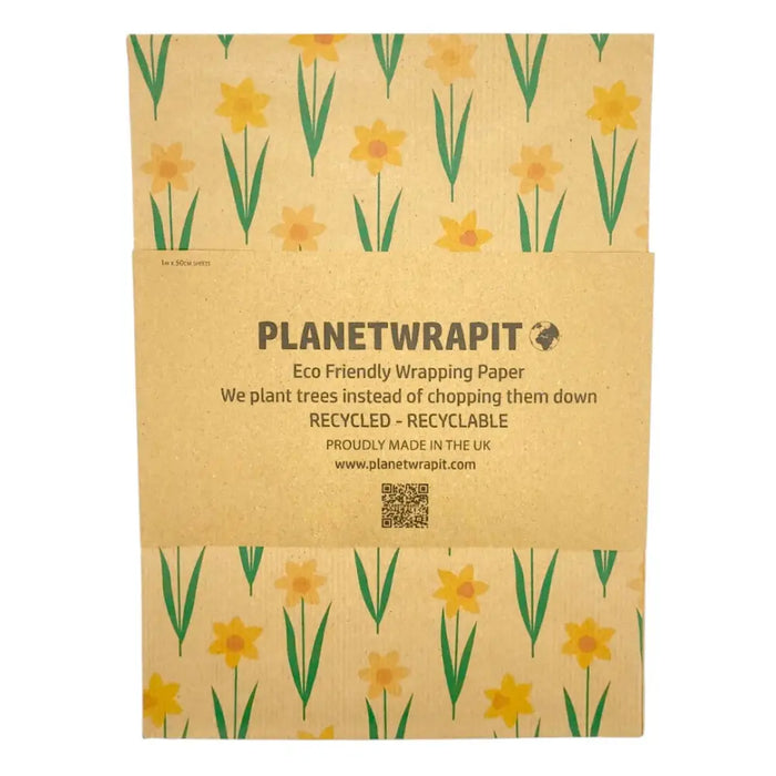 Beige recycled kraft gift wrap with yellow daffodils green stems and planetwrapit brand name on a folded sheet