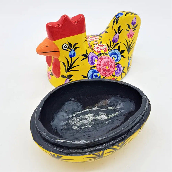 Vibrant yellow ceramic hen trinket box from dalit goods with kashmiri style floral patterns in pink purple and blue