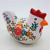 A white ceramic hen trinket box with vibrant red blue orange and purple floral patterns kashmiri style dalit goods