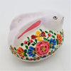 A white ceramic dalit goods kashmiri style rabbit trinket box with hand-painted pink blue orange and yellow flowers