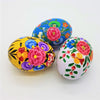 Hand-painted dalit goods kashmiri style wooden easter eggs with bright floral designs in pink blue yellow and green