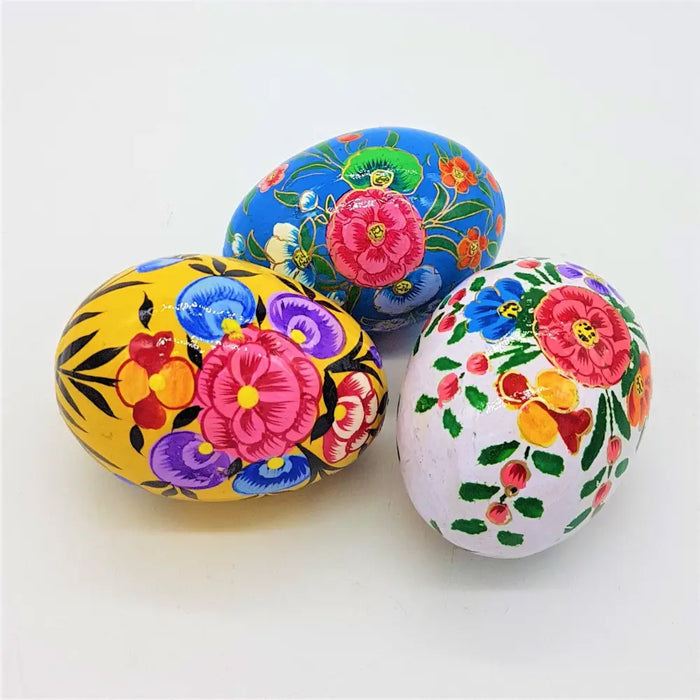 Hand-painted dalit goods kashmiri style wooden easter eggs with bright floral designs in pink blue yellow and green