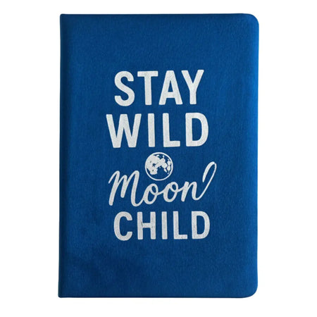 Dark blue velvet notebook with 80 pages featuring white stay wild moon child text and a small globe graphic on cover