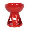 Deep bowl ceramic oil burner in vibrant red with a glossy finish and triangular cutouts on the base