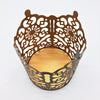 Brown metal owl-shaped decorative basket with intricate cut-out patterns and gold interior metal votive prussian style