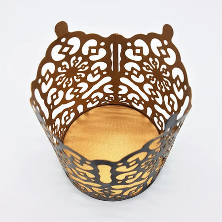 Brown metal owl-shaped decorative basket with intricate cut-out patterns and gold interior metal votive prussian style