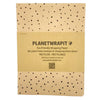 Brown recycled kraft wrapping paper with black polka dots and planetwrapit label folded as an a4 sheet