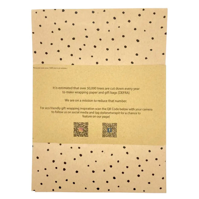 Dots recycled eco kraft wrapping paper shows brown recycled kraft with black polka dots folded in a compact sheet
