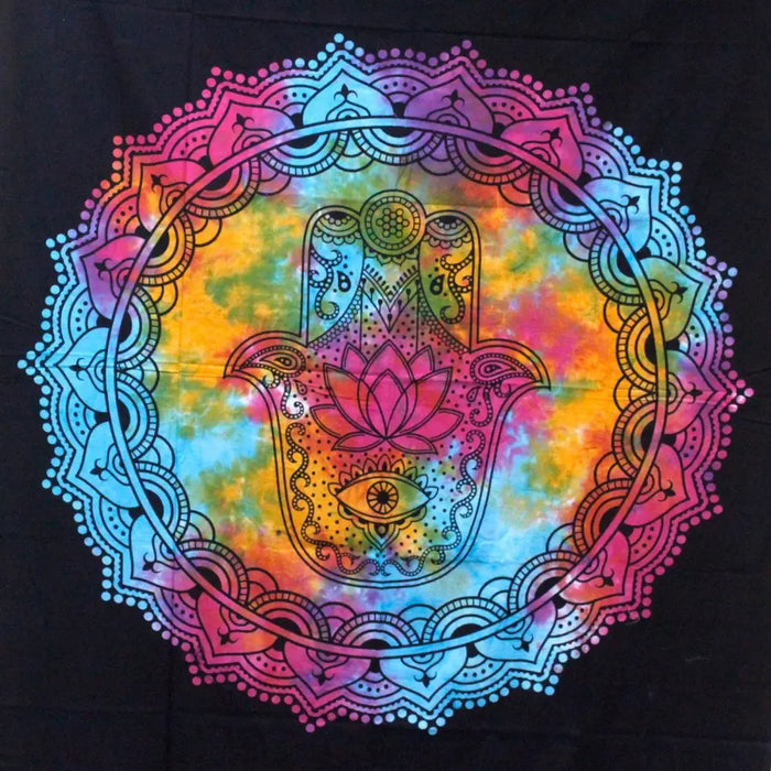 Double cotton bedspread with vibrant tie-dye rainbow hues featuring a black hamsa hand and mandala patterns