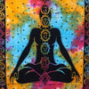 Vibrant tie-dye double cotton bedspread with black meditating figure and rainbow chakra symbols on starry background