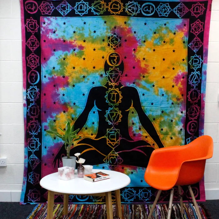Double cotton bedspread with vibrant tie-dye and black meditating figure showing seven chakra symbols in psychedelic colors