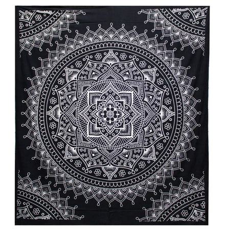 Black cotton bedspread with white lotus mandala design used as a wall hanging or decorative textile