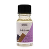 A clear glass bottle with pale yellow dream fragrance oil and black cap labeled ancient wisdom dream with allergen declarations