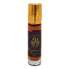 A sleek 8ml glass rollerball bottle of dream spirit amber agarwood perfume oil with a gold cap and black label