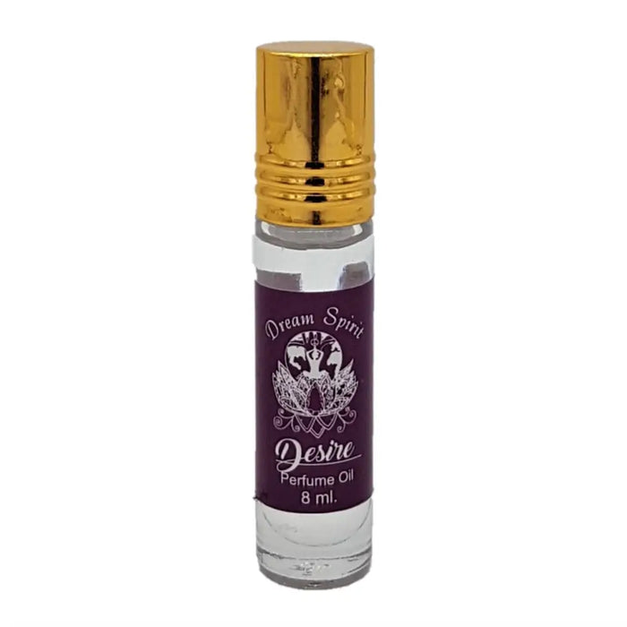 A clear glass roll-on bottle with gold cap and purple label of dream spirit perfume oil 8 ml from a fragrance selection