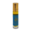 A small glass rollerball bottle of dream spirit perfume oil with gold cap and blue label containing golden-yellow oil