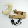 A rustic driftwood table lamp with a fibreglass half-moon shade grey and a clear led bulb in a black socket