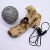 Natural wood root driftglow lamp with grey luna shade and black electrical plug and cord