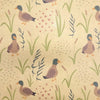 Beige recycled kraft wrapping paper with duck print featuring gray head brown body orange beak among green reeds