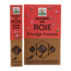 Red and brown cardboard packaging for earth inspired smudge incense palo santo with rose showing floral designs and incense sticks