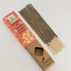 A pack of palo santo smudge incense sticks with a reddish orange and brown earth inspired smudge box by yagra