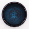 Dark blue ceramic earth powder singing bowl with embossed floral and figure patterns from blue mantra five buddha series