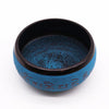 Blue mantra five earth powder singing bowl with intricate engraved designs and sanskrit mantras around the rim