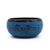 Blue mantra five earth powder singing bowl with dark brown rim and engraved sanskrit script