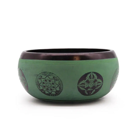 Green tibetan earth powder singing bowl with dark brown rim and intricate black mandala buddha designs