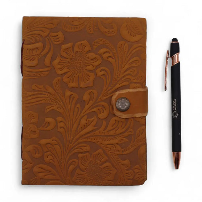 Tan leather notebook with floral embossed leather cover and silver button closure in 7 by 5 size