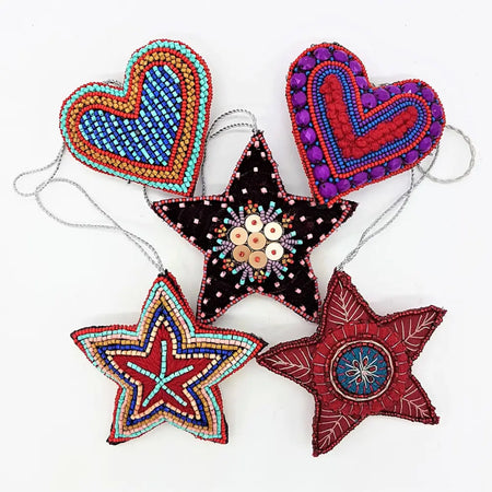 Handcrafted hanging ornaments in five designs with embroidered and beaded heart and star shapes in vibrant colors