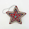 A vibrant five-pointed star hanging ornament with multicolored beads in red turquoise blue and peach from five designs