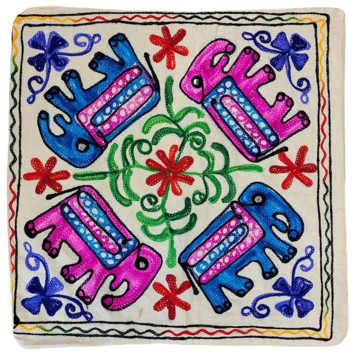 Embroidered cushion cover with pink and blue elephants red flowers and green vines on cream standard cushion fabric