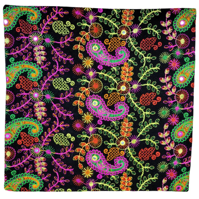 Embroidered velveteen cushion cover with neon pink lime green orange and yellow paisley floral patterns on black background