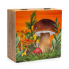 Wooden keepsake box made of mango wood with orange toadstools and green foliage on an orange sky background